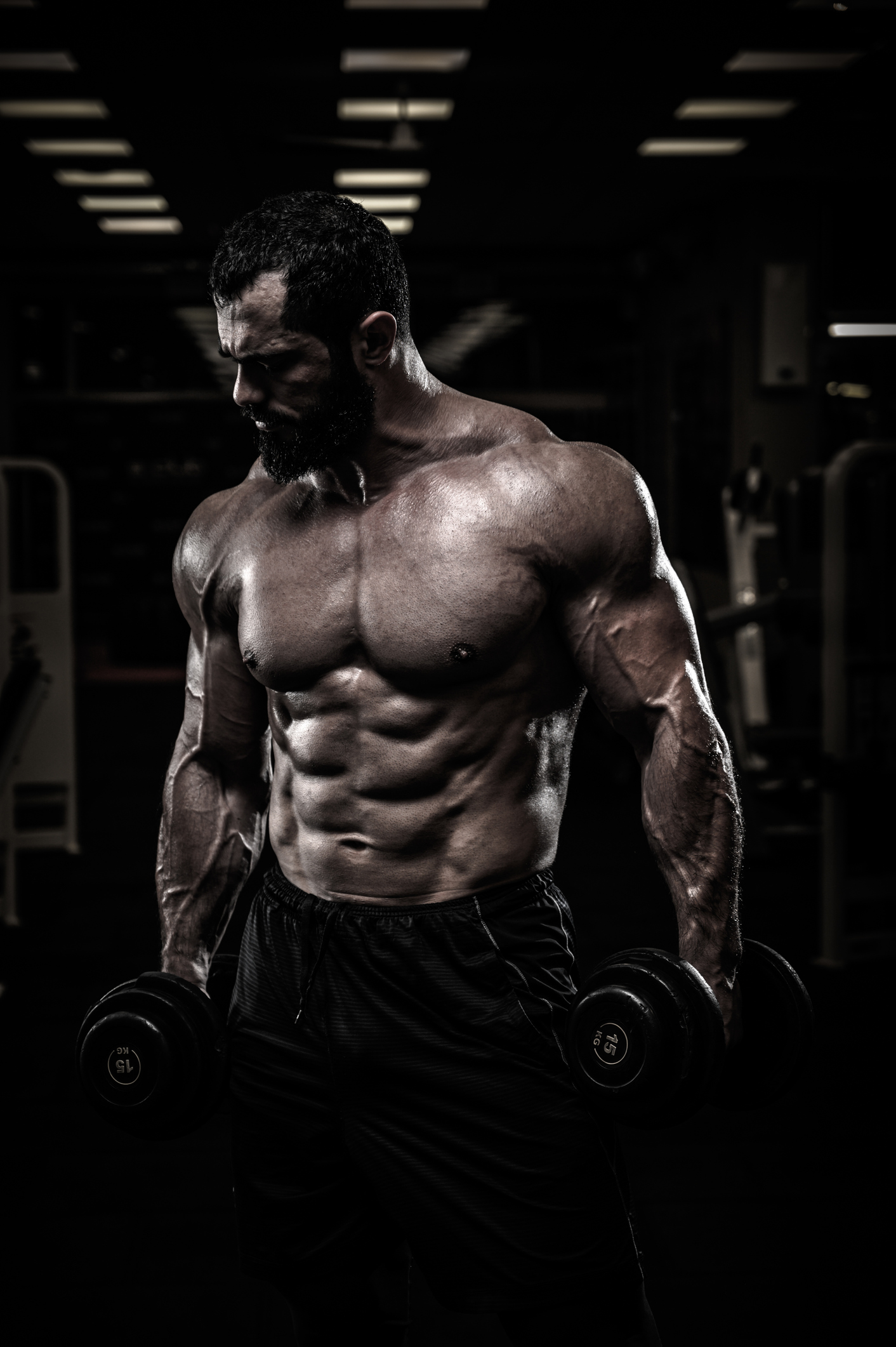 Natural bodybuilding competitor training in a gym; image used to illustrate athlete integrity screening, not a specific case.