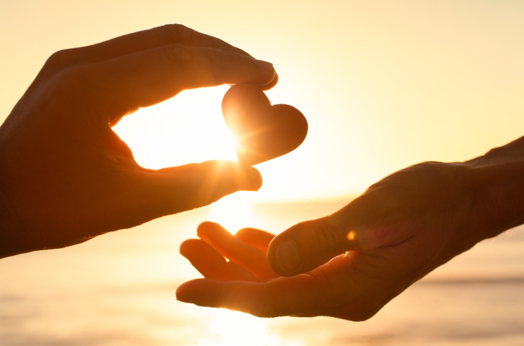 Relationship Trust Assessment — two hands in golden light